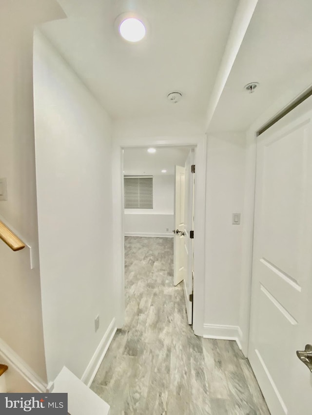 hall featuring light hardwood / wood-style flooring