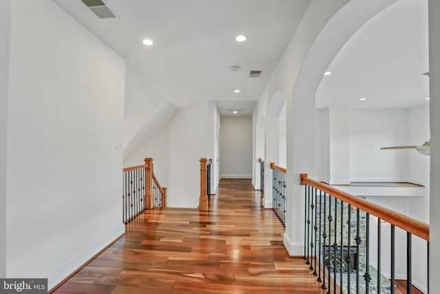 corridor featuring wood-type flooring