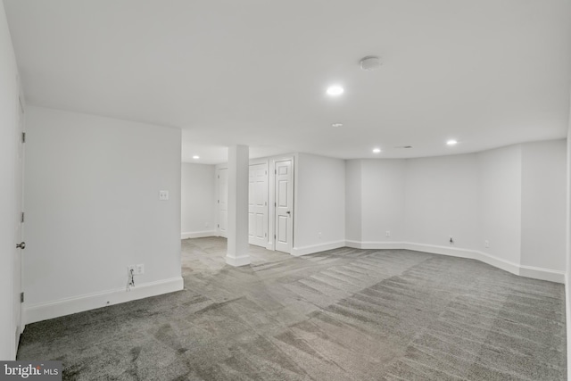 empty room with light colored carpet