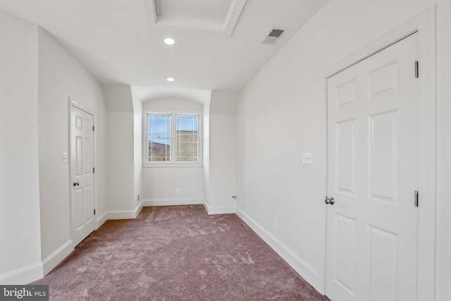 unfurnished bedroom with dark carpet