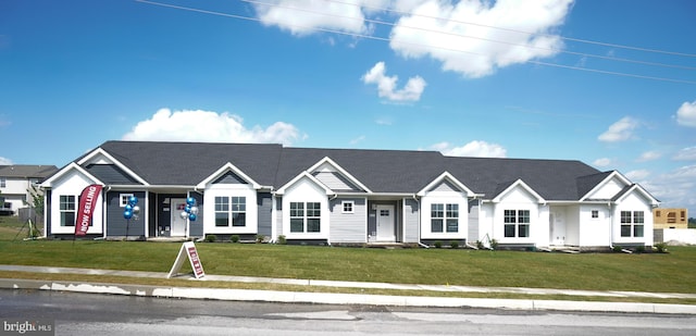 ranch-style home with a front yard