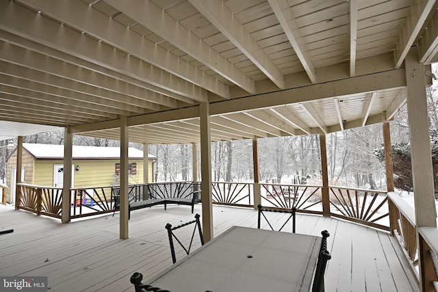 view of snow covered deck