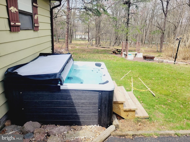 exterior space with a hot tub