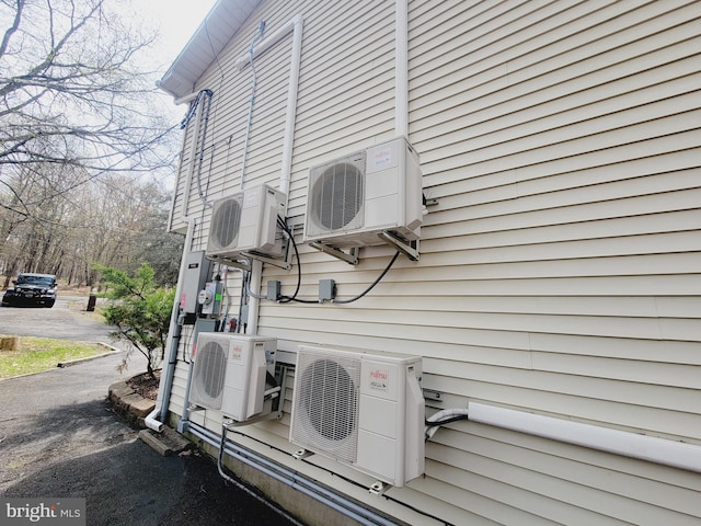 view of home's exterior with ac unit