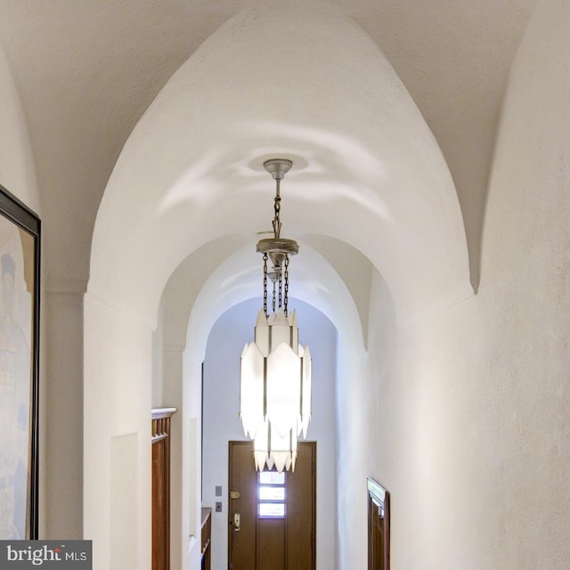 interior details featuring a notable chandelier