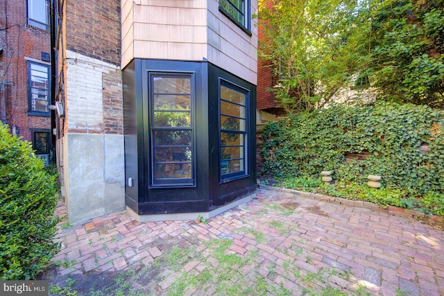 property entrance with a patio