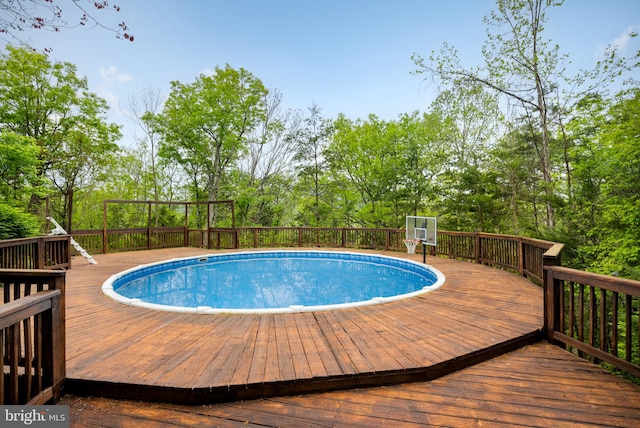 view of pool featuring a deck