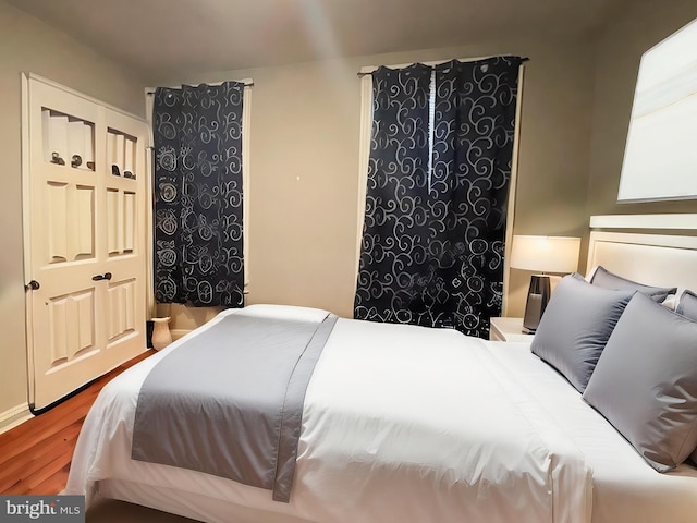 bedroom featuring hardwood / wood-style floors