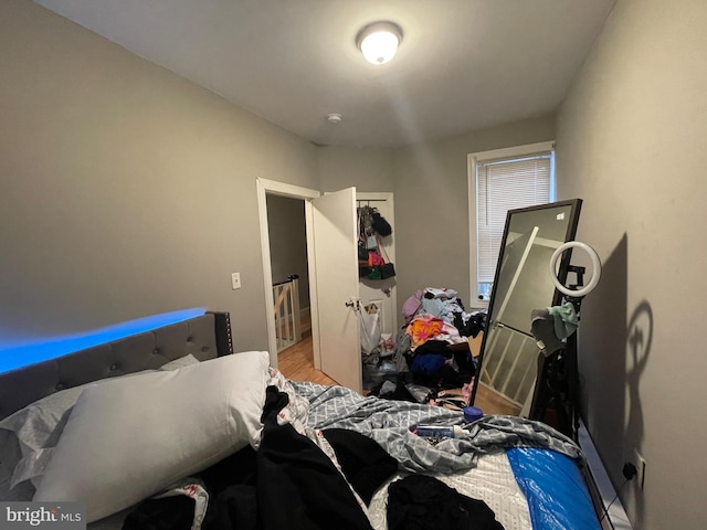 bedroom with wood-type flooring