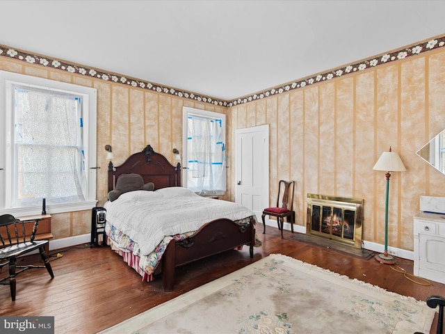 bedroom featuring dark hardwood / wood-style floors