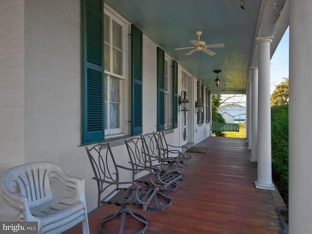 view of terrace with a porch and ceiling fan