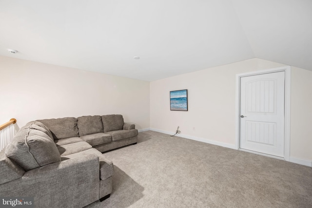 living room with lofted ceiling and light carpet