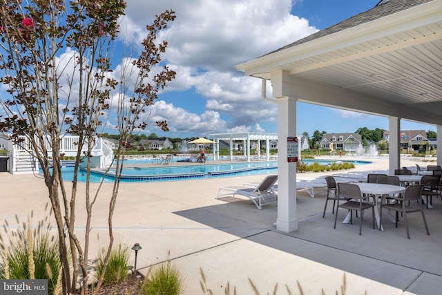 view of patio / terrace featuring a community pool