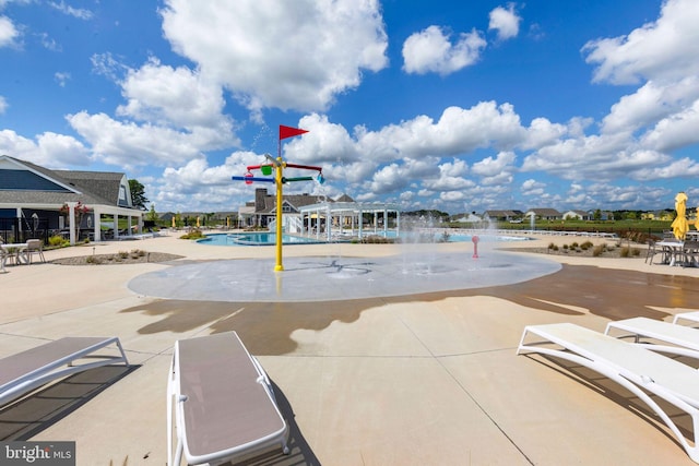 view of play area featuring a patio area