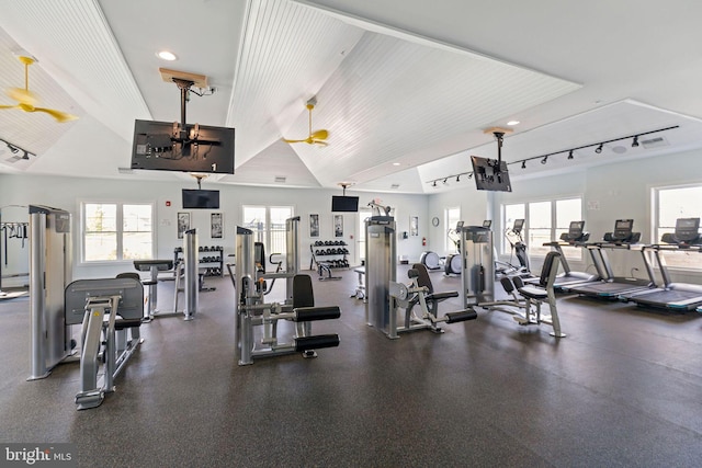 gym featuring ceiling fan and track lighting