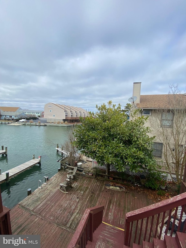 view of dock with a water view