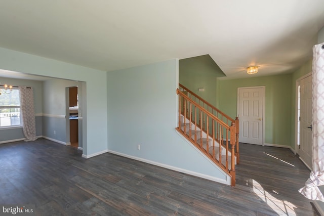 foyer with dark wood-type flooring