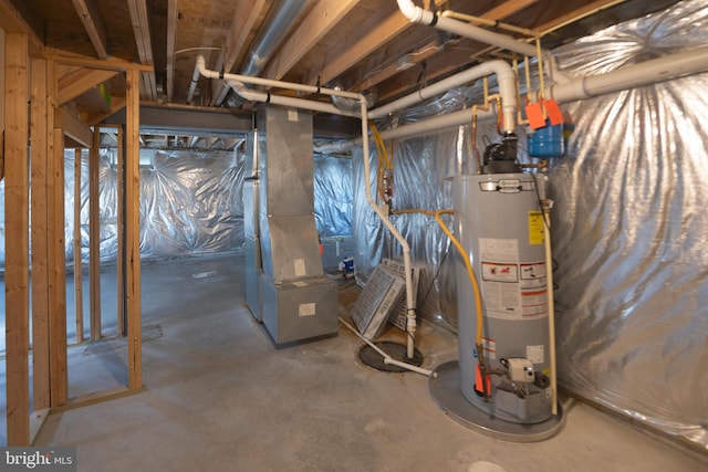 basement with water heater and heating utilities