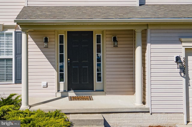 entrance to property with a porch