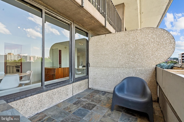 view of patio / terrace featuring a balcony