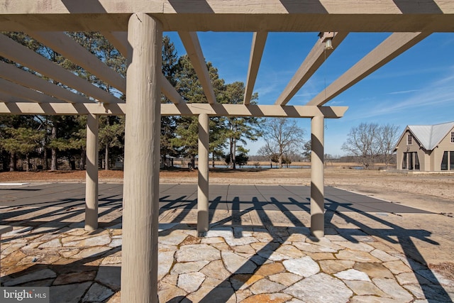 view of terrace with a pergola