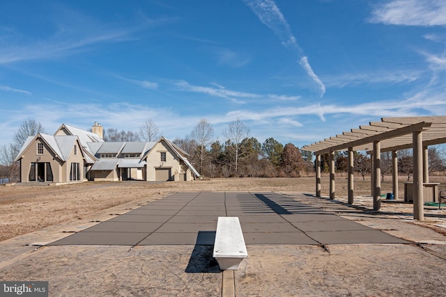 view of property's community with a pergola