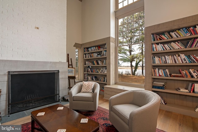 sitting room featuring hardwood / wood-style floors