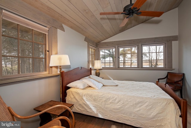 bedroom with wooden ceiling, vaulted ceiling, ceiling fan, and hardwood / wood-style flooring