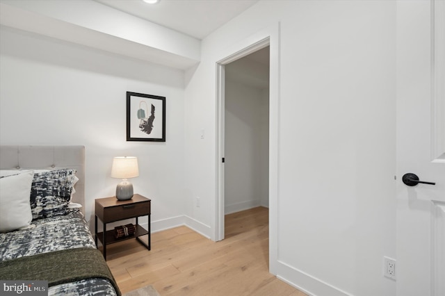 bedroom featuring light wood-type flooring