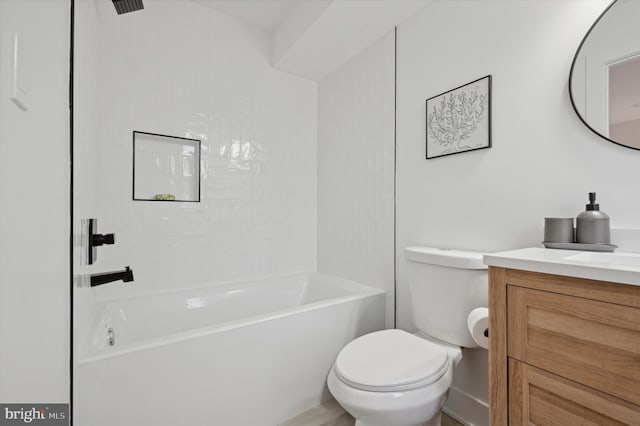 full bathroom featuring toilet, vanity, and bathing tub / shower combination