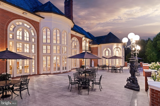 patio terrace at dusk with french doors