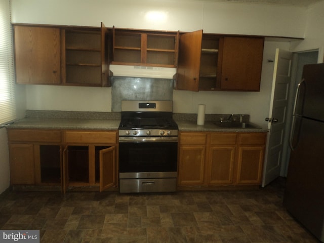 kitchen with appliances with stainless steel finishes and sink