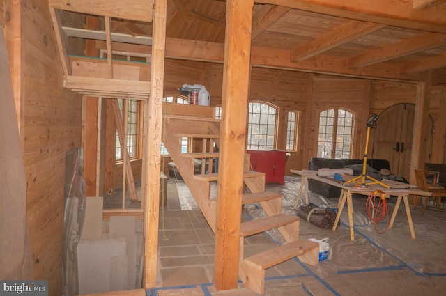 miscellaneous room with wood walls