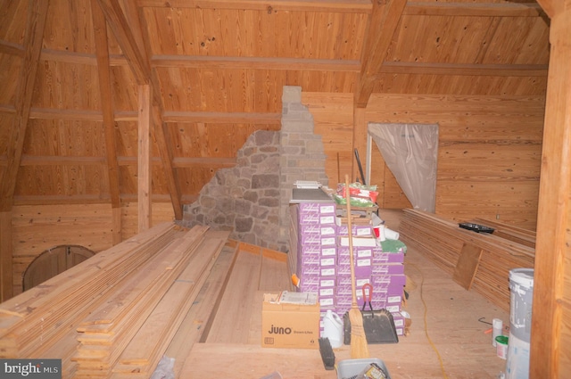 view of sauna featuring wooden walls