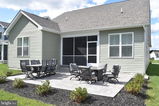 rear view of house featuring a patio area