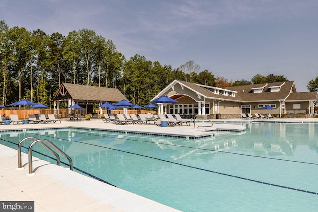 view of swimming pool with a patio area