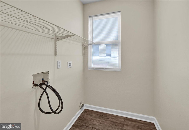 washroom with washer hookup, hookup for an electric dryer, and dark hardwood / wood-style flooring