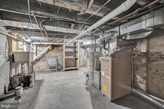 basement featuring gas water heater and heating utilities