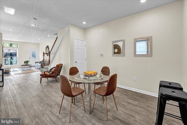 dining area featuring hardwood / wood-style flooring