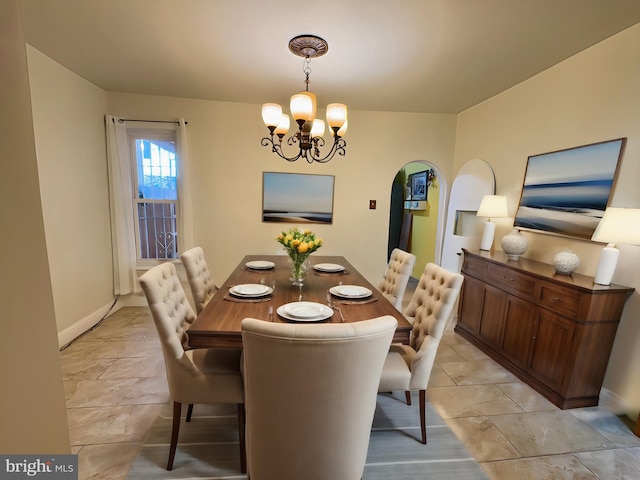 dining room featuring a chandelier