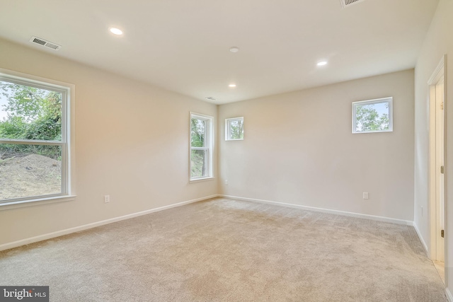 view of carpeted spare room