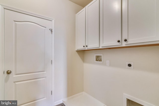 laundry area featuring hookup for a washing machine, hookup for an electric dryer, and cabinets