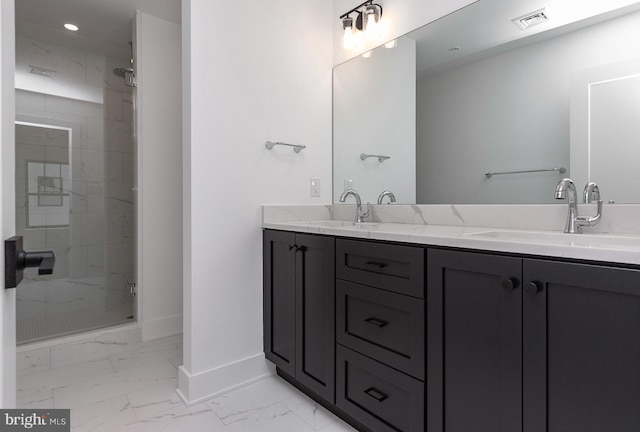 bathroom featuring tile flooring, a tile shower, and dual bowl vanity