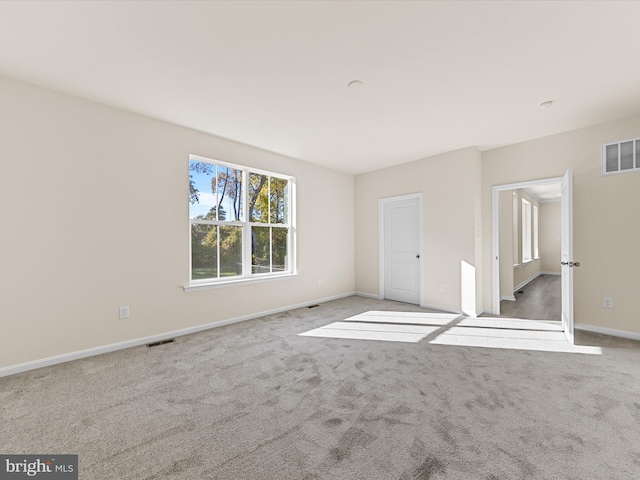 view of carpeted spare room