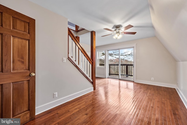 additional living space with ceiling fan, vaulted ceiling, and hardwood / wood-style flooring