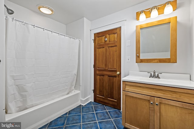 bathroom featuring tile floors, shower / bath combo with shower curtain, and vanity