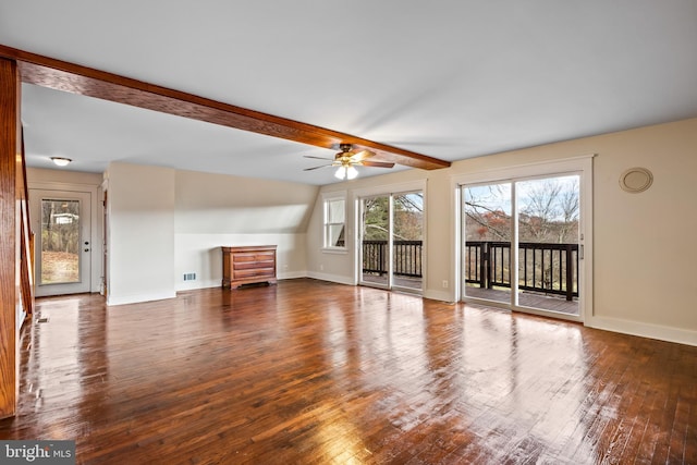 unfurnished living room with beamed ceiling, wood-type flooring, and ceiling fan