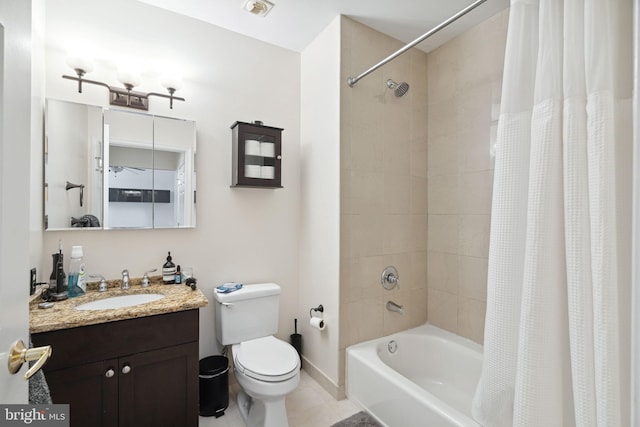 full bathroom featuring vanity, tile floors, toilet, and shower / bathtub combination with curtain