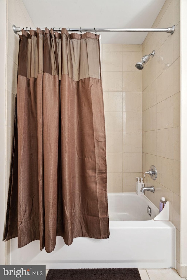 bathroom featuring shower / bath combination with curtain