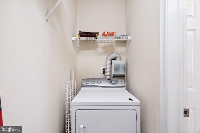 laundry room with washer / dryer